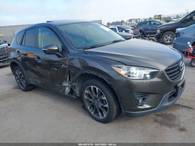  Salvage Mazda Cx