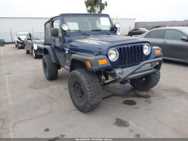  Salvage Jeep Wrangler