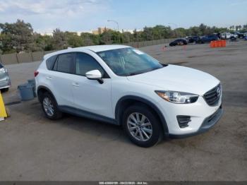  Salvage Mazda Cx