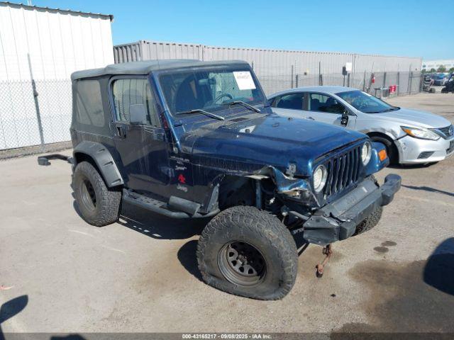  Salvage Jeep Wrangler